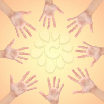 Circle made of hands isolated on beautiful background