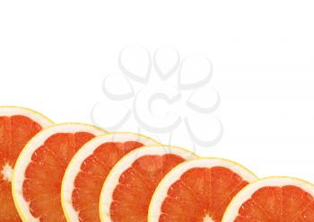 Ripe sliced of red grapefruit isolated on white background