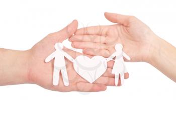 Paper family in hand with a big heart isolated on white