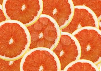 fresh grapefruit and slices background