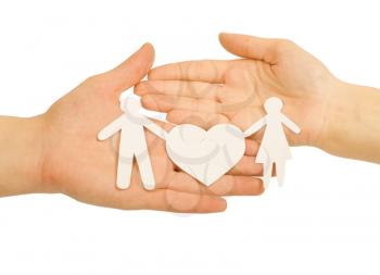 Paper family in hand with a big hearth isolated on white