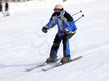 The skier quickly goes from mountain in winter equipment
