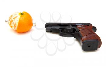 The close up of a pistol  Rakes a tangerine is isolated on a white background