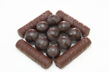 Dark brown Chocolate balls on white background
