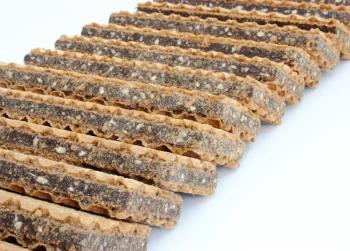 Wafer cookies with chocolate are isolated on a white background