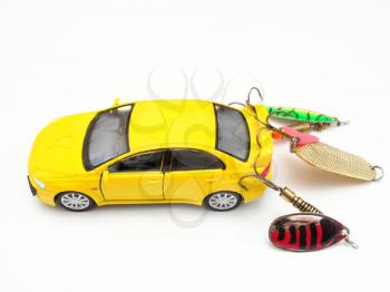 The car of yellow color caught on a spinner for the big predatory fish