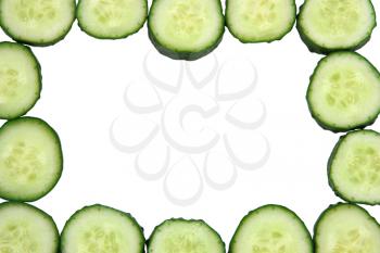 Framed with cucumbers isolated on white background