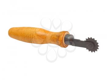 roller cutter for a tailor with a wooden handle on a white background