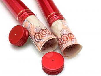 Cigars in packing from which stick out money of red color with a cover