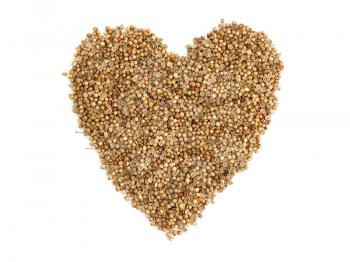 coriander seeds a heart on white background