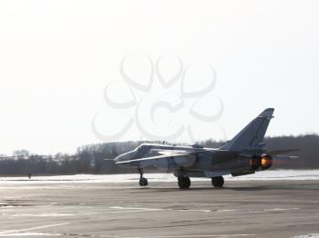 Military jet bomber Su-24 Fencer on take off 