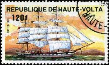 REPUBLIC OF UPPER VOLTA- CIRCA 1984: A stamp printed in Republic of Upper Volta shows the ship Harbinger, series is devoted to sailing vessels, circa 1984