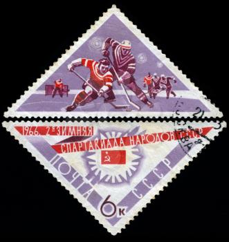 USSR - CIRCA 1966: A post stamp printed in USSR shows ice hockey, devoted to the Winter Games of people of the USSR, series, circa 1966
