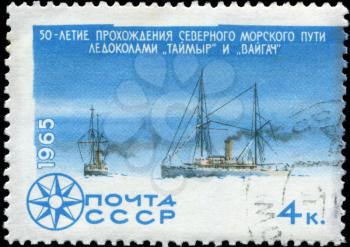 USSR - CIRCA 1965: stamp printed in USSR shows a Icebreakers with inscription “Passing of Northern Sea Route icebreakers Taimyr and Vaigach from series Investigation Arctic & Antarctic, circa 196