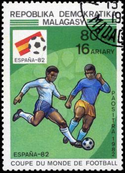 MALAGASY - CIRCA 1982: A post stamp printed in Malagasy shows shows football, series devoted World Cup in Spain, circa 1982.
