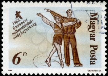 HUNGARY - CIRCA 1988: A stamp printed in Hungary, shows Skaters from 19th century, with inscription and name of series World Figure Skating Championships, Budapest, 1988, circa 1988