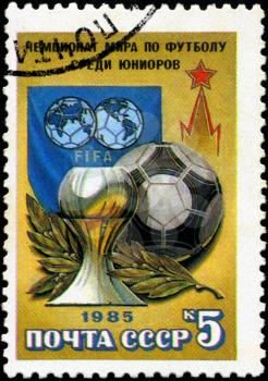 USSR - CIRCA 1985: A stamp printed by USSR shows football players. Junior World Championship, series, circa 1986