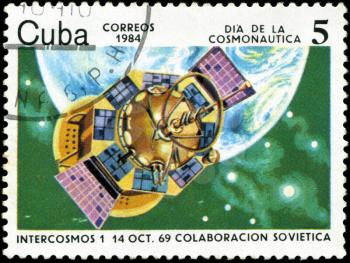 CUBA CIRCA 1984: stamp printed by CUBA, shows Cosmonautics Day - Intercosmos January 14 October 69 Soviet cooperation, CIRCA 1984