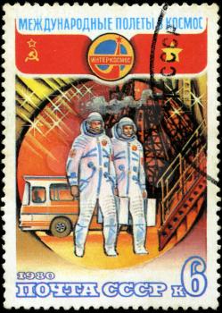 USSR - CIRCA 1980: A stamp printed in USSR, International flights into space, Intercosmos, astronauts go landing, circa 1980