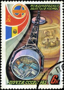 USSR - CIRCA 1981: A stamp printed in the USSR, shows international flights in space, circa 1981
