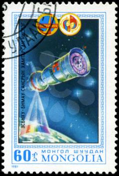 MONGOLIA- CIRCA 1981: A stamp printed in Mongolia shows spacestation Salut, stamp from series honoring Intercocmos program, circa 1981.