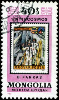 MONGOLIA - CIRCA 1980: A stamp printed in Mongolia showing stamp with cosmonaut B. Farkas, circa 1980