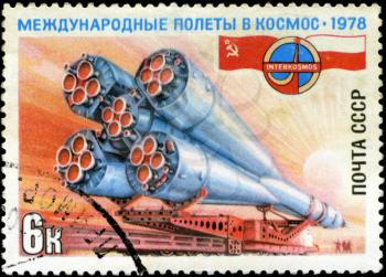USSR - CIRCA 1978: A stamp printed in USSR, International flights into space, Intercosmos, delivery of spacecraft to rocket launch pad for space flight, circa 1978