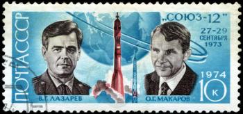 USSR - CIRCA 1974: A Stamp printed in USSR shows the cosmonauts V.G. Lazarev and O.G. Makarov, and Soyuz 12, series, circa 1974