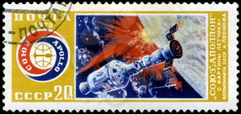 USSR - CIRCA 1975: A stamp printed in USSR shows International flight of Soyuz and Apollo, circa 1975