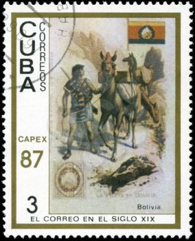 CUBA - CIRCA 1987: A stamp printed in the Cuba, shows traditional old vehicles. Bolivian llama, circa 1987