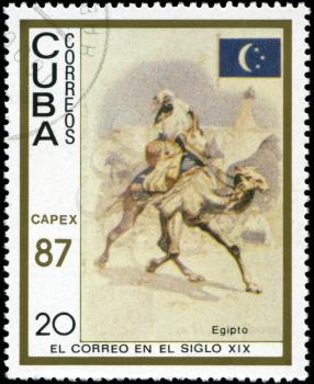 CUBA - CIRCA 1987: A stamp printed in the Cuba, shows traditional old vehicles. Egyptian camel, circa 1987