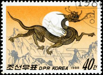 DPR KOREA - CIRCA 1988: the stamp printed by Korea of DPR shows a dragon, circa 1988