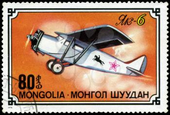 MONGOLIA- CIRCA 1976: A stamp printed in Mongolia shows airplane Jak-6, series, circa 1976
