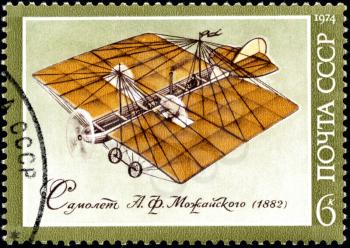 RUSSIA - CIRCA 1974: A stamp printed in USSR, show the first plane constructed Mozhaiskiy A.F., circa 1974