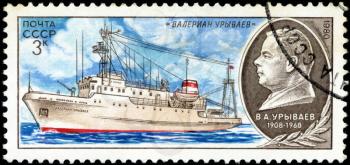 USSR - CIRCA 1980: A stamp printed in USSR (Russia) shows Portrait of a scientist and a ship his name with inscription Valerian Uryvaev from the series Soviet Scientific Research Ships, circa 1980
