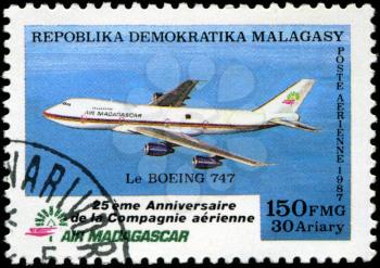REPUBLICA MALAGASY - CIRCA 1987: A stamp printed in Malagasy (Madagascar) shows plane Boeing 747, circa 1987