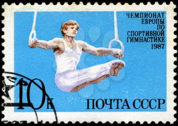 USSR - CIRCA 1987: a stamp printed by USSR shows gymnast, European Gymnastics Championships, Moscow 1987, circa 1987
