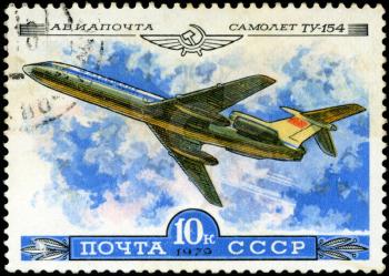 USSR - CIRCA 1979: A Stamp printed in USSR shows the Aeroflot Emblem and aircraft with the inscription Airmail, Aircraft Tu-154, from the series History of the Soviet aircraft industry, circa 1979