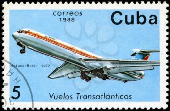 CUBA - CIRCA 1988: A Stamp printed in CUBA shows image of the airplane in transatlantic flight, Habana - Berlin in 1972, circa 1988