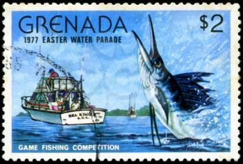 GRENADA - CIRCA 1977: A stamp printed in Grenada issued for the easter water parade  shows game fishing competition, circa 1977.