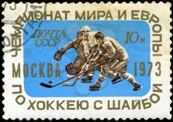 USSR - CIRCA 1973: a stamp printed by USSR shows hockey players, series World and Europe championships on hockey, circa 1973