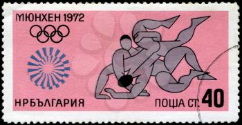BULGARIA - CIRCA 1972: A stamp printed in BULGARIA shows Wrestling with the inscription and name of series Summer Olympic Games in Munich, 1972, circa 1972