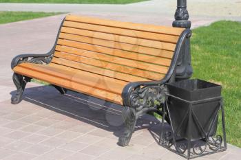wooden bench with an urn