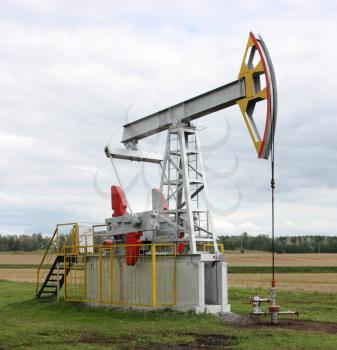 Oil pumpjack. Oil industry equipment.