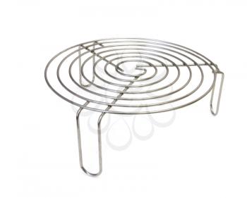 Metal trivet for hot tableware isolated on white background.