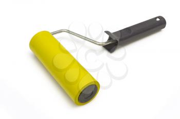 Yellow rubber paint roller on a white background.