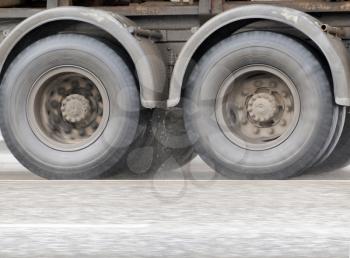Low angle view of wheels of heavy truck