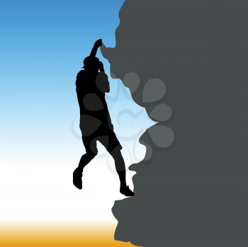 Black silhouette rock climber on against the blue sky.