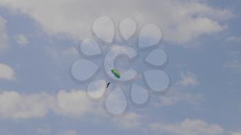 MOSCOW - SEP 2: Skydiver descends by parachute at a celebration in honor of the 70th anniversary of the launch of the first aircraft An-2 on September 2, 2017 in Moscow, Russia.