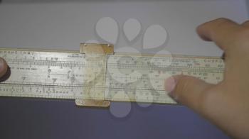 High-precision hand-held calculating tools - logarithmic ruler wooden. UltraHD stock footage.